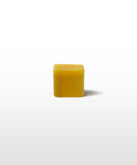 a small cube of wax